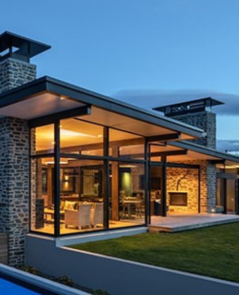 Alpine Terrace - house lit up at night